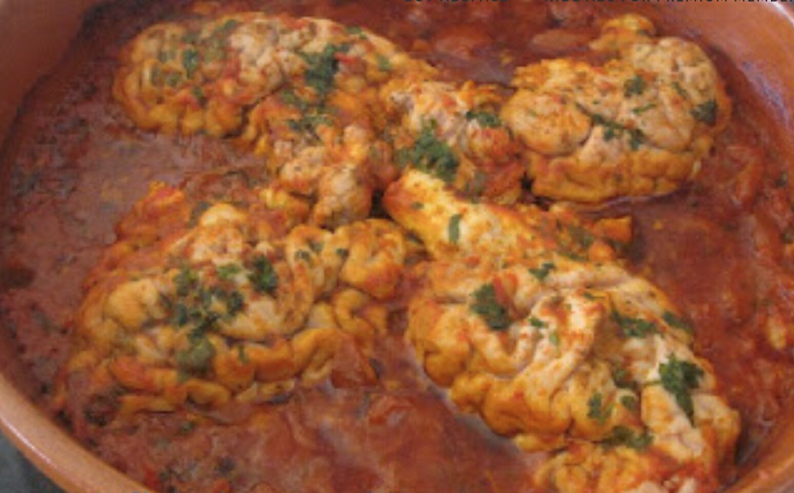 Authentic Moroccan El Mokh Mchermel: Marinated Lamb or Calf Brains in Tomato Sauce